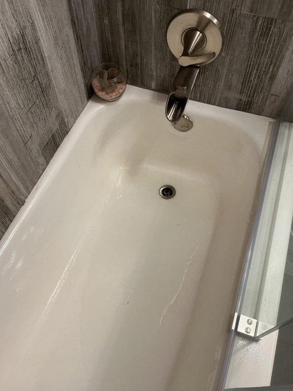 Responded to service call for clogged shower drain and toilet with intermittent flushing issues in shared bathroom. Upon arrival, assessed both fixtures and determined blockage in shower drain line. Utilized drain auger to clear obstruction from shower drain, restoring proper water flow. Inspected toilet mechanism and identified issue with flush valve preventing consistent operation. Adjusted flush valve components and tested multiple cycles to verify proper flushing function. Both fixtures returned to normal operation upon completion of service.