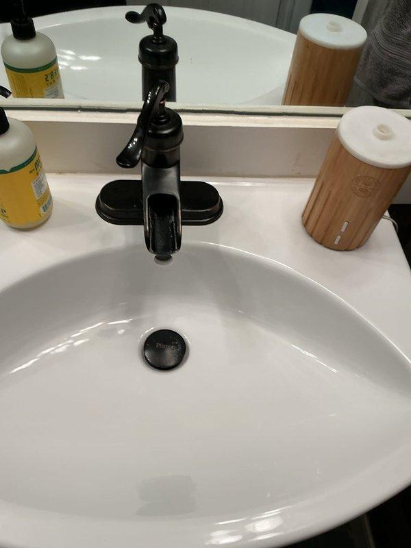 Responded to service call for clogged shower drain and toilet with intermittent flushing issues in shared bathroom. Upon arrival, assessed both fixtures and determined blockage in shower drain line. Utilized drain auger to clear obstruction from shower drain, restoring proper water flow. Inspected toilet mechanism and identified issue with flush valve preventing consistent operation. Adjusted flush valve components and tested multiple cycles to verify proper flushing function. Both fixtures returned to normal operation upon completion of service.