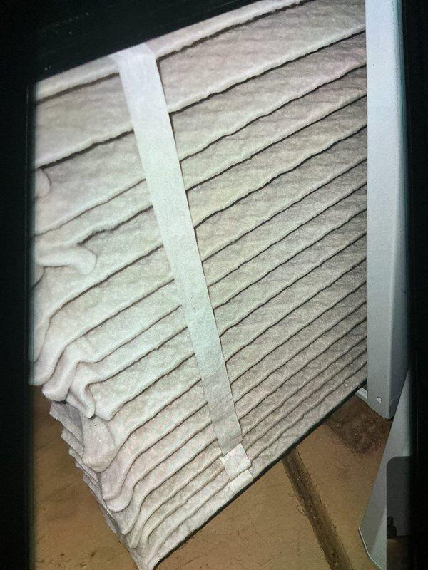 Completed MVP furnace maintenance service including full system inspection and air filter replacement. Removed heavily soiled pleated air filter showing significant dust and particle accumulation, installed new filter with proper seating in mounting frame, and verified all refrigerant lines and connections were secure with no visible leaks or damage.