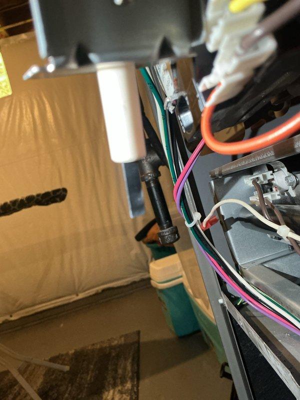 Completed comprehensive tune-up and cleaning on a 4-year-old Lennox gas furnace model WT 09-2032. Performed full system inspection including electrical connections, capacitor testing, and control board verification. Inspected condensate drainage system with ball valve operation and confirmed proper function. All components tested within manufacturer specifications and system operating efficiently.