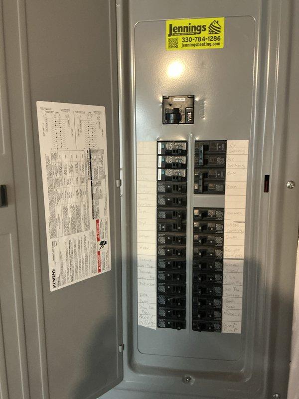 Completed complimentary electrical inspection under maintenance plan coverage. Performed comprehensive evaluation of main electrical panel, verifying proper circuit breaker operation and labeling accuracy. Documented existing circuit directory with handwritten notations identifying major appliances including air conditioning units, oven, and microwave circuits. Confirmed panel organization and accessibility for future service needs.