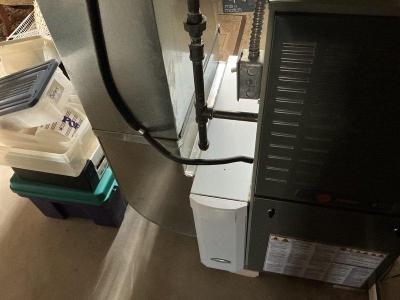 Performed estimate for furnace replacement on 12-13 year old Trane unit after identifying cracked heat exchanger during inspection. Documented existing system configuration including ductwork connections, venting, and mechanical room layout with photos, and provided quote for complete furnace replacement due to safety concerns associated with heat exchanger failure.
