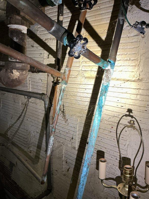 Responded to no hot water complaint at residential property. Upon inspection, found existing tanked water heater had failed and required complete replacement. Assessed existing plumbing infrastructure including aged copper supply lines, shutoff valves, and connections showing significant corrosion and deterioration. Removed old water heater unit and installed new tanked water heater with proper venting and code-compliant connections. Tested all hot water fixtures to confirm proper operation and adequate water temperature throughout the home.