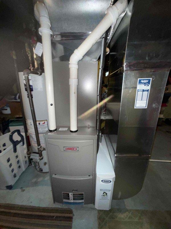 Completed MVP furnace maintenance on Lennox heating system. Performed comprehensive inspection of furnace cabinet, heat exchanger, blower assembly, and all associated components. Verified proper operation of burners, ignition system, and safety controls. Inspected PVC venting system and condensate drainage. Checked refrigerant lines and ductwork connections for secure installation. All components found to be operating within manufacturer specifications with no deficiencies noted.