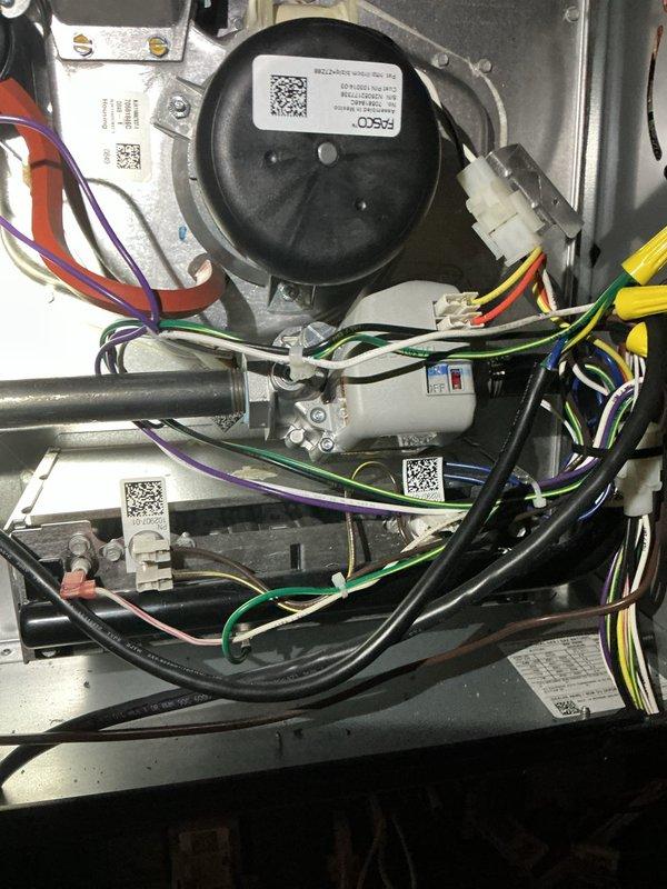 Performed scheduled heating maintenance on the gas furnace, inspecting the inducer motor, gas valve, and control wiring for secure connections and proper condition. Removed the flame sensor, which showed corrosion and carbon buildup, and cleaned it to restore reliable flame sensing and ignition performance.