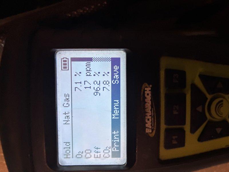 Performed furnace maintenance including removal and replacement of a heavily soiled air filter to restore proper airflow. Conducted combustion analysis with a Bacharach analyzer on natural gas, recording O2 at 7.1%, CO at 17 ppm, CO2 at 7.8%, and steady-state efficiency of 96.2%, confirming safe and efficient operation within normal parameters.