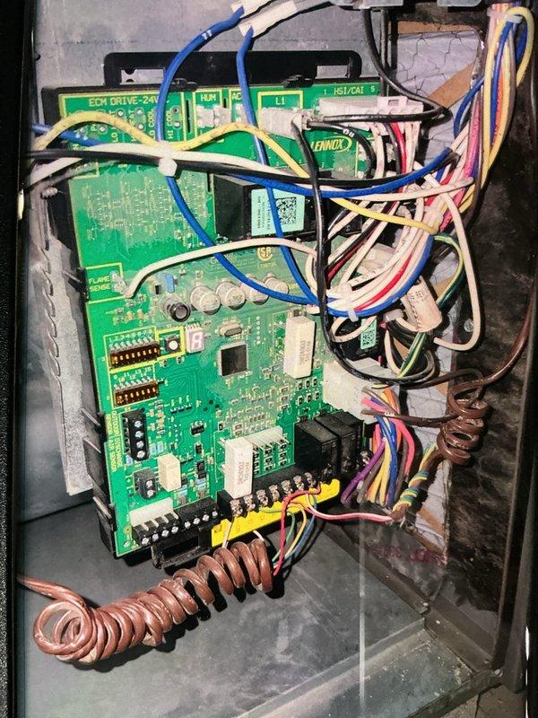 Performed seasonal heating maintenance on a Lennox gas furnace, inspecting the return air filter, which showed light dust loading, and the control board and wiring harness, which showed no evidence of damage, corrosion, or overheating. Verified wiring connections and securement, and noted dust accumulation inside the cabinet. The system was left in good operating condition.