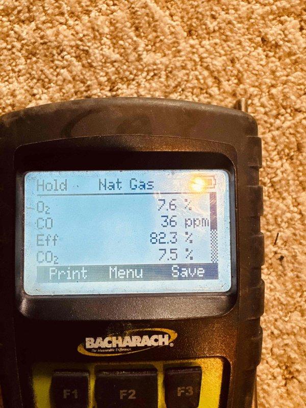 Performed MVP heating maintenance on the gas-fired furnace, including a combustion analysis with a Bacharach analyzer. Flue gas readings were O₂ 7.6%, CO 36 ppm, CO₂ 7.5%, and steady-state efficiency 82.3%, with CO within acceptable limits. Inspection of the blower and heat exchanger compartment revealed significant rust and corrosion on the housing, brackets, and fasteners; recommend monitoring the corrosion and evaluating moisture or condensate sources to prevent further deterioration.