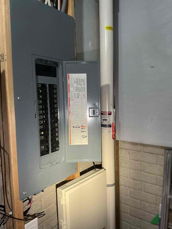 Performed an on-site electrical estimate for installation of a standby generator, including inspection of the existing Square D HOM load center to evaluate panel capacity, breaker configuration, and available space for a transfer switch or generator interlock. Documented the panel directory, breaker ratings, and surrounding clearances and routing conditions for the proposed equipment.