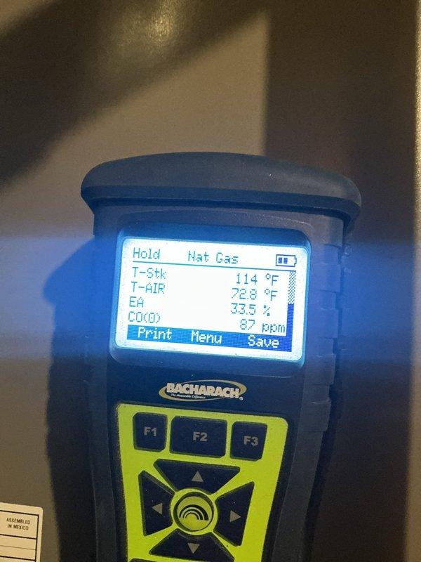 Performed scheduled heating maintenance and combustion analysis on the gas-fired furnace. Measured supply plenum temperature at 31.7°F and ran a Bacharach analyzer on natural gas, recording stack temperature of 114°F, ambient air at 72.8°F, 33.5% excess air, and CO at 87 ppm. Verified equipment operation and documented all readings for the service record.