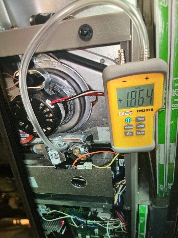 Performed scheduled preventive maintenance on two air conditioning systems and two gas furnaces (four systems total). On the furnace, verified gas manifold pressure with a digital manometer, inspected the inducer motor assembly, gas valve, and control board for proper operation, and serviced the flame sensor/ignitor components. Inspected return air filters (16x25x1) and confirmed all systems were operating within normal parameters.