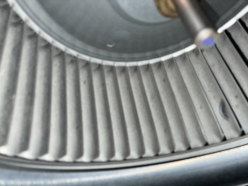 Performed seasonal heating maintenance on a 5-year-old system, including inspection and cleaning of the blower wheel to remove accumulated dust and debris for improved airflow and motor efficiency. Inspected the humidifier water panel and found heavy mineral and rust scaling, which reduces humidification performance, and recommended panel replacement and routine cleaning of the housing.