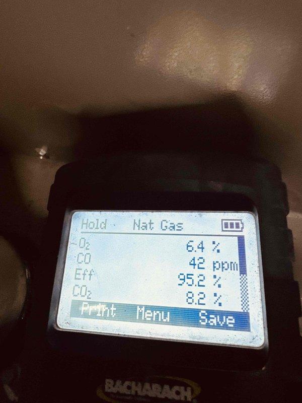 Performed a seasonal tune-up on a 9-year-old Lennox gas furnace, including inspection of the integrated control board, wiring, and blower compartment, and cleaning of accumulated dust and debris. Conducted a combustion analysis on natural gas, recording O2 at 6.4%, CO at 42 ppm, CO2 at 8.2%, and steady-state efficiency of 95.2%, confirming safe and efficient operation. The system was left operating properly.