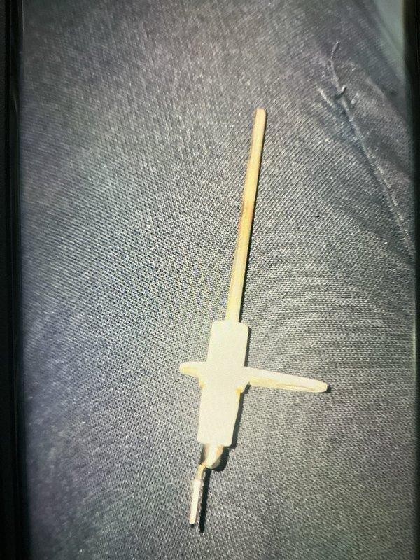Performed seasonal heating tune-up on a Goodman gas furnace, including inspection of the flue, gas supply piping, condensate drain, and electrical connections. Removed and inspected the flame sensor, which showed discoloration and wear, and cleaned it to restore proper flame rectification. Verified safe, normal furnace operation and confirmed the system is operating properly.