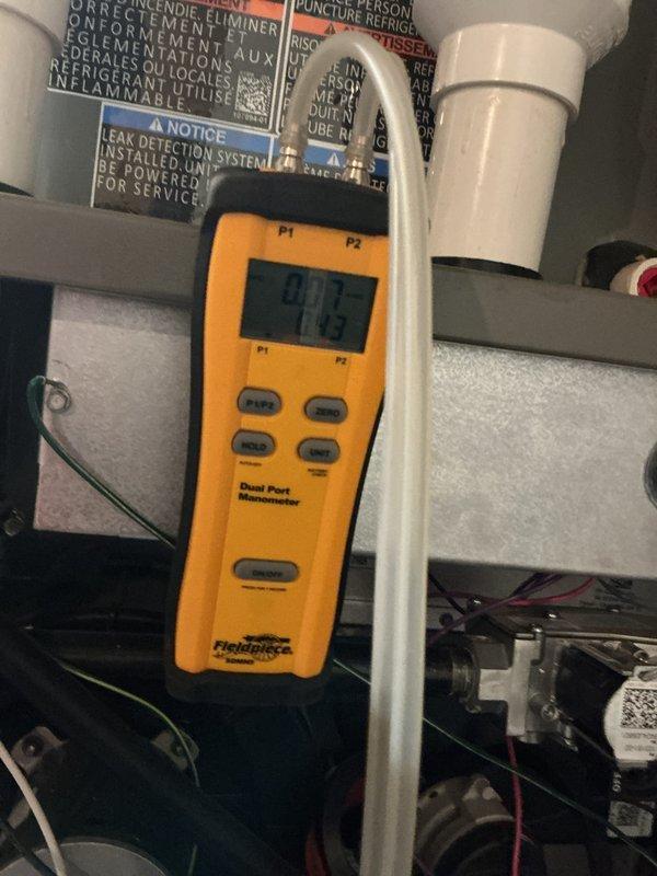 Performed scheduled heating maintenance on the gas furnace, including inspection of the gas valve assembly, pressure switch, wiring connections, and condensate/venting components. Verified gas pressure and system pressure readings using a digital dual-port manometer, with all components found in good working condition and no visible corrosion, damage, or abnormalities noted.