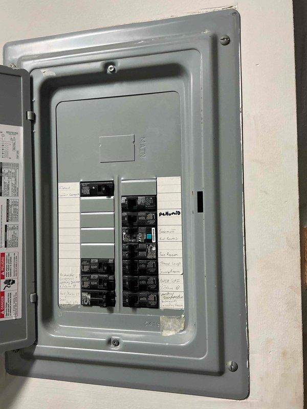 Performed an on-site evaluation for a standby generator replacement, as the existing Generac unit is aged and not operating properly. Inspected the main electrical service panel, including the breaker layout, circuit directory labeling, available breaker spaces, and panel condition, and documented water staining on the directory strip along with an AFCI-protected circuit. Gathered the information needed to size and quote a new generator installation with transfer switch connection.