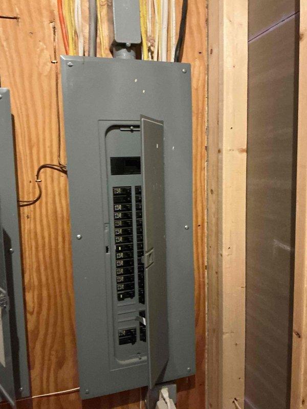 Performed an on-site assessment for a new exterior outlet installation, including inspection of the main breaker panel, existing branch circuit wiring, and available panel capacity. Evaluated cable routing options from the panel and surrounding joist area to the exterior wall location, and noted loose conductors and unsecured wiring near the panel that should be addressed during installation. Provided an estimate for the proposed outlet installation work.