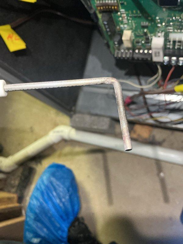Performed annual furnace maintenance, including inspection of the blower wheel and housing using a borescope and servicing of the flame sensor. Verified control board connections and wiring, and confirmed the condensate PVC drain piping was properly routed and in good condition. Unit was left operating normally.