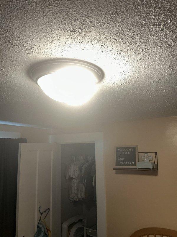 Conducted an on-site assessment for the installation of one light fixture, two receptacle outlets, and two ceiling fans. Evaluated existing ceiling-mounted fixtures, including a flush-mount dome light and a ceiling fan with light kit, and documented ceiling conditions, including surface cracking, to determine mounting and electrical requirements. Compiled scope-of-work details for quote preparation; no installation work was performed during this visit.