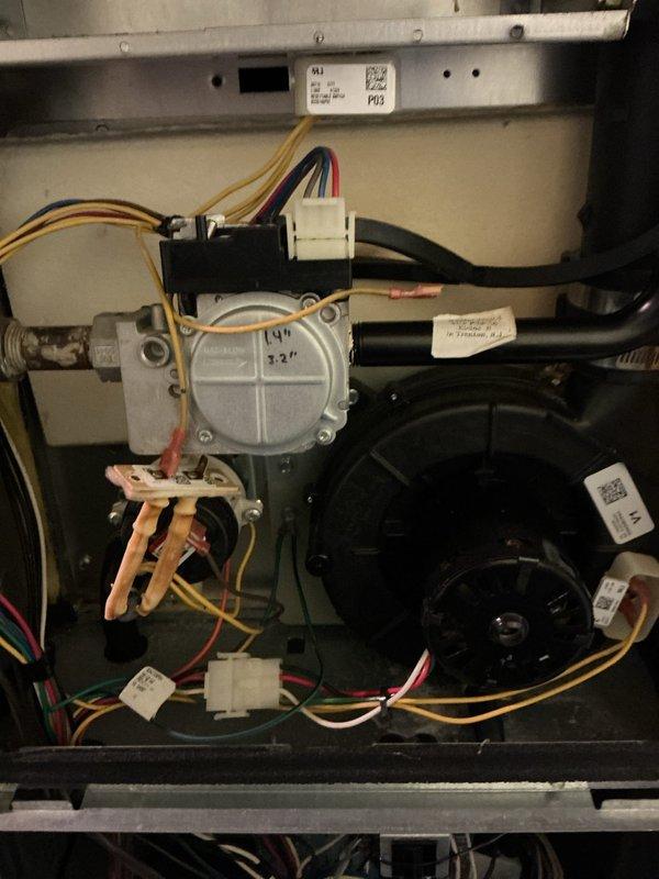 Performed annual heating maintenance on a 13-year-old gas furnace, including inspection of the gas valve assembly, burner section, inducer motor, and blower compartment, along with wiring, connectors, and limit/rollout switch. Noted accumulated dust and soot on the burners and cabinet floor, heat-discolored ignitor/flame sensor leads, and rust and corrosion on the gas pipe fittings, and recommended continued monitoring given the age of the unit. The customer is eligible to renew their maintenance plan.