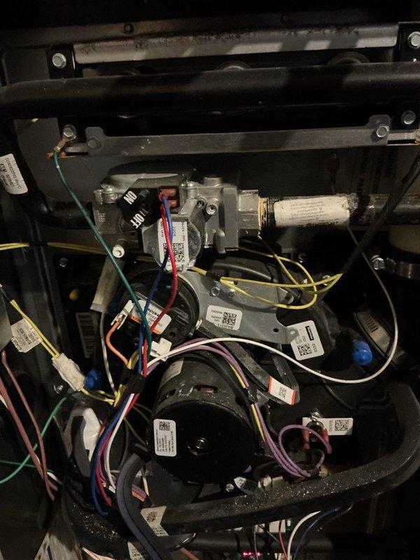 Responded to a no-heat complaint on a 9-year-old gas furnace blowing only cold air. Inspected the gas valve, inducer/blower motor, control board, transformer, and low-voltage wiring harnesses to diagnose the ignition and heat-production fault, then completed repairs and cleared accumulated dust and debris from the cabinet interior. Verified proper operation through a full heating cycle with warm air delivery restored.
