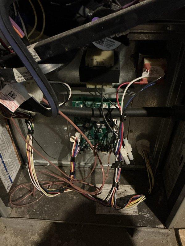 Responded to a no-heat complaint on a 9-year-old gas furnace blowing only cold air. Inspected the gas valve, inducer/blower motor, control board, transformer, and low-voltage wiring harnesses to diagnose the ignition and heat-production fault, then completed repairs and cleared accumulated dust and debris from the cabinet interior. Verified proper operation through a full heating cycle with warm air delivery restored.