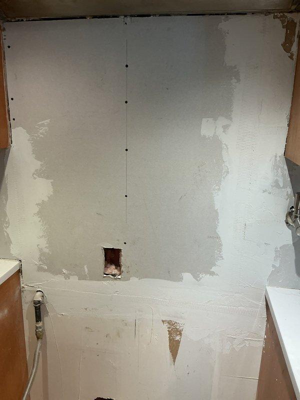 Re-fed the kitchen range hood circuit, removing the outlet above the stove and rerouting the hood vent supply down to the stove receptacle location behind the range to clear the wall for renovation. Replaced the foyer chandelier and installed a customer-provided under-cabinet light fixture, with all devices tested for proper operation.