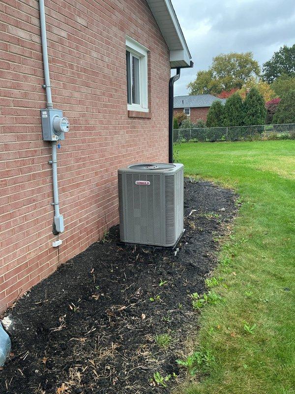 Performed a cooling maintenance inspection on the residential split system, including the outdoor Lennox condenser unit, which was found clear of debris with no visible damage, and the indoor Lennox furnace/air handler installation. Inspected the condensate drain piping and valve, refrigerant line set and insulation, flue connection, and the AprilAire humidifier and filter housing, with no signs of rust, frost, ice buildup, or leakage observed. The system was verified to be in good operating condition.