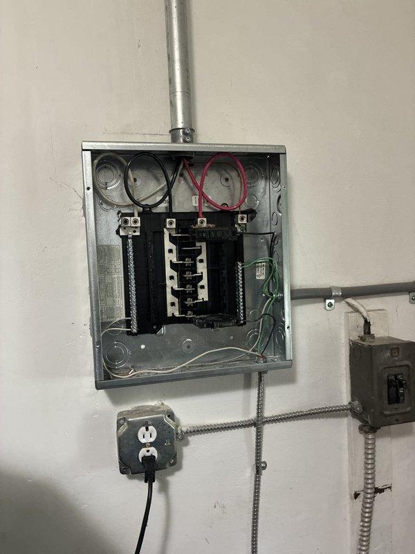 Installed a dedicated circuit for the tankless water heater, routing conduit from the service panel with heavy-gauge conductors and a proper equipment ground, and terminating at a new breaker in the panel. Secured all conduit runs with straps, verified connections and torque at the terminals, and confirmed the circuit operates correctly under load with the unit powered and functioning.