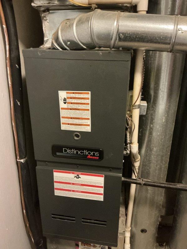 Responded to a no-heat call on a 10-year-old Amana Distinctions gas furnace and inspected the unit, including the control compartment, low-voltage wiring, transformer, and relay components, which showed heavy dust accumulation and several wire-nut splices. Performed diagnostics on the ignition and control circuit to determine the cause of the failure to start, and addressed the wiring and component conditions found to restore operation.