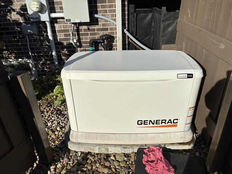 Performed scheduled annual maintenance on a 22 kW Generac Guardian standby generator, including engine oil and filter service and a general inspection of the unit and surrounding pad area. The generator was found in good working condition with no issues identified, and the unit was left operational and in standby mode.