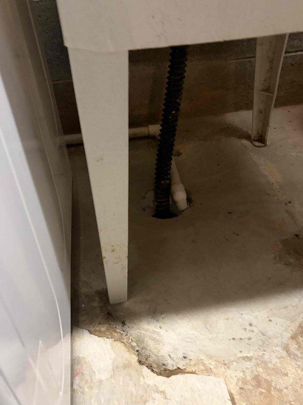 Installed a complete HVAC system consisting of an 80% AFUE gas furnace, matching air conditioning system, and whole-home humidifier. Connected the unit to the existing galvanized supply ductwork, reconnected the gas supply with a shutoff valve and insulated line, and wired low-voltage thermostat and control connections at the terminal junction. Routed condensate drainage to the existing floor drain and verified proper system operation.