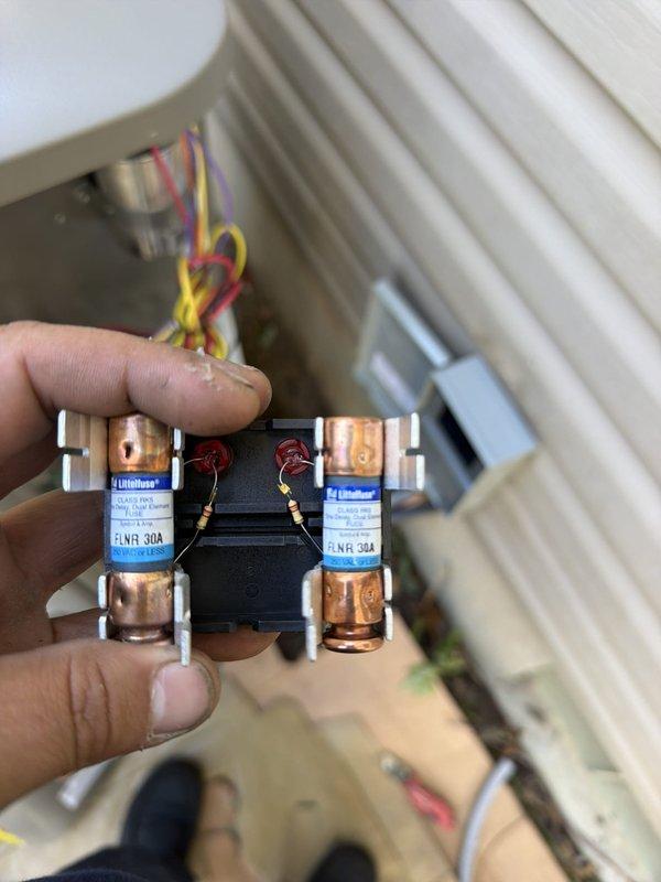 Installed a complete 90% AFUE gas furnace and matching air conditioning system, including setup of the outdoor condensing unit with a new exterior electrical disconnect and properly sized 30A Class RK5 time-delay dual-element fuses. Routed and secured flexible conduit and refrigerant lines to the outdoor unit, verified electrical connections, and confirmed the equipment showed no signs of damage or corrosion upon completion.
