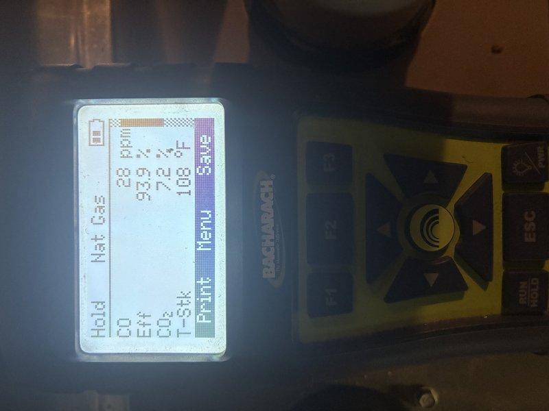 Performed a recurring heating maintenance inspection on the gas-fired furnace, including combustion analysis with a calibrated analyzer (CO 28 ppm, CO2 7.2%, stack temperature 108°F) and electrical testing of the inducer and blower motor circuits with a true RMS clamp meter. Inspected the gas valve, control board, wiring harness, and condensate/vent piping; components were dusty but showed no signs of rust, frost, or damage, and the unit is operating normally.