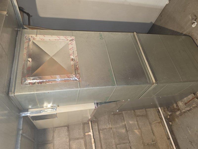 Installed a new 90% AFUE high-efficiency gas furnace, connecting it to the existing galvanized supply plenum and ductwork with a sealed access panel secured using foil tape at all joints. Routed and secured PVC venting and condensate drain piping along the wall to the utility area, ensuring proper termination and drainage.