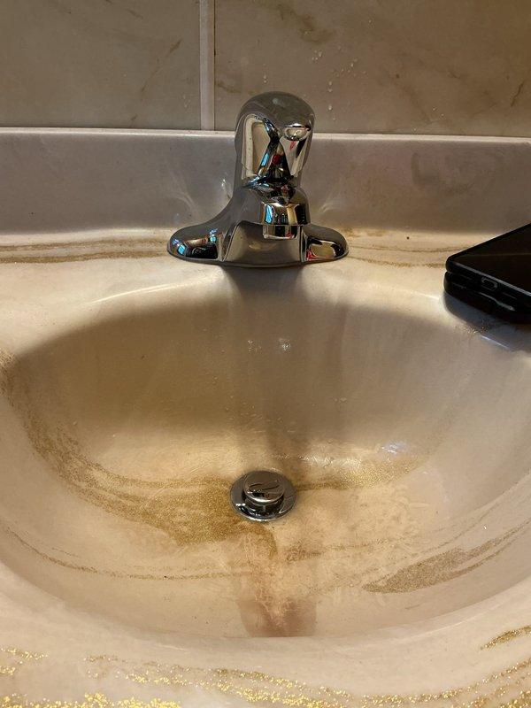 Installed a new 40-gallon Bradford White gas water heater with a 6-year manufacturer warranty, including a new ball valve, thermal expansion tank, and gas shut-off, and connected it to the existing flue, copper supply lines, and gas piping. Also replaced the lavatory faucet with a new Moen Chateau single-handle faucet in a chrome finish. Verified proper operation of both installations.