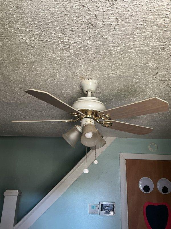 Inspected and serviced the interior ceiling fan and light kit, verifying secure mounting, blade bracket integrity, downrod and canopy connection, and proper operation of the fan motor, pull-chain controls, and three-bulb lighting. Evaluated the exterior porch electrical fixtures for function and safe operation, and confirmed all serviced components are operating correctly.