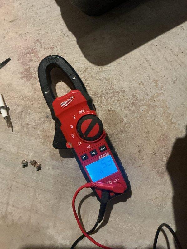 Performed scheduled heating maintenance, including electrical testing of the ignition circuit with a digital clamp meter and inspection of the igniter and terminal hardware. Measured gas manifold pressure with a digital manometer (reading approximately 7.5 in. w.c.) to verify proper burner operation, and checked the PVC condensate and vent piping connections.