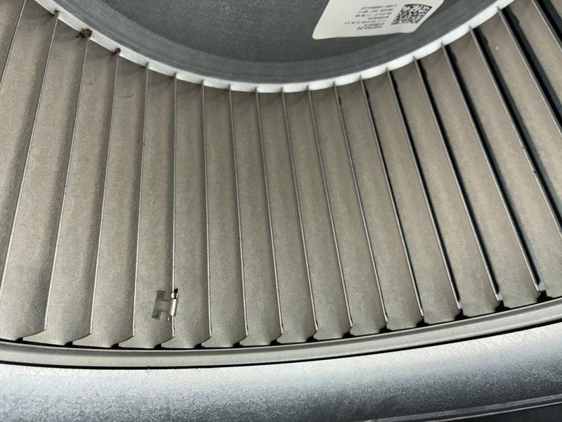 Performed annual preventative maintenance on a 4-year-old gas furnace, including inspection and cleaning of the blower assembly, where dust and debris buildup on the squirrel cage blades was addressed to restore proper airflow and balance. Inspected the bypass humidifier water panel and found heavy mineral scale accumulation along with a frayed wire at the humidifier; recommend panel replacement and repair of the damaged wiring to ensure safe and efficient humidification.