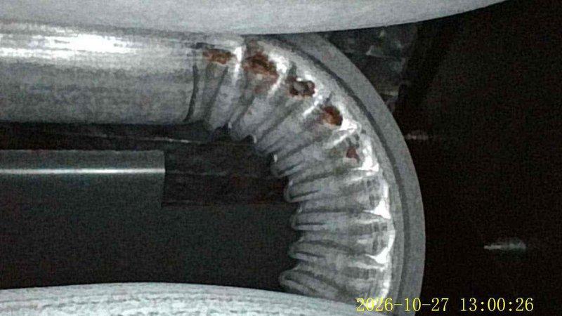 Responded to a water leak at a 7-year-old gas furnace and performed a diagnostic inspection using a borescope. The inspection revealed corrosion along the heat exchanger and flue-side seams, with rust scaling and deterioration at the joints, along with corrugated flexible venting showing early rust spotting. These conditions are consistent with condensation leakage, and further evaluation of the heat exchanger and venting components is recommended to determine the source of the moisture and prevent further degradation.
