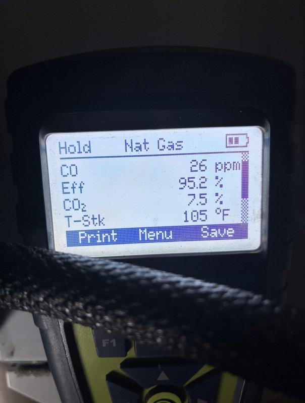 Performed annual maintenance on a 2-year-old natural gas furnace, including inspection of the gas valve assembly, wiring connections, and cabinet interior, and noted light dust and lint accumulation and minor surface rust on the cabinet. Conducted combustion analysis, which showed stable, safe operation with CO at 26 ppm, CO2 at 7.5%, stack temperature of 105°F, and combustion efficiency of 95.2%.