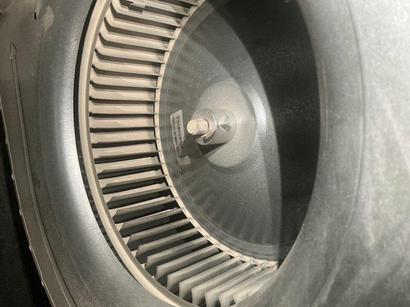 Performed annual furnace maintenance, including inspection and replacement of the fiberglass return air filter, which showed dust loading and discoloration. Accessed and inspected the blower assembly, noting a light accumulation of dust and debris on the squirrel-cage wheel blades and housing, and verified the wheel was secure on its shaft. System was left clean and operational with improved airflow.