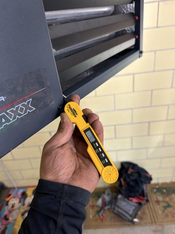 Installed a customer-supplied wall-mounted garage heater, including mounting, connection of the unit, and roof penetration with vent pipe and flashing for exhaust venting. Performed a post-installation inspection and used a digital meter to verify proper operation, with no visible frost, rust, or other anomalies observed.