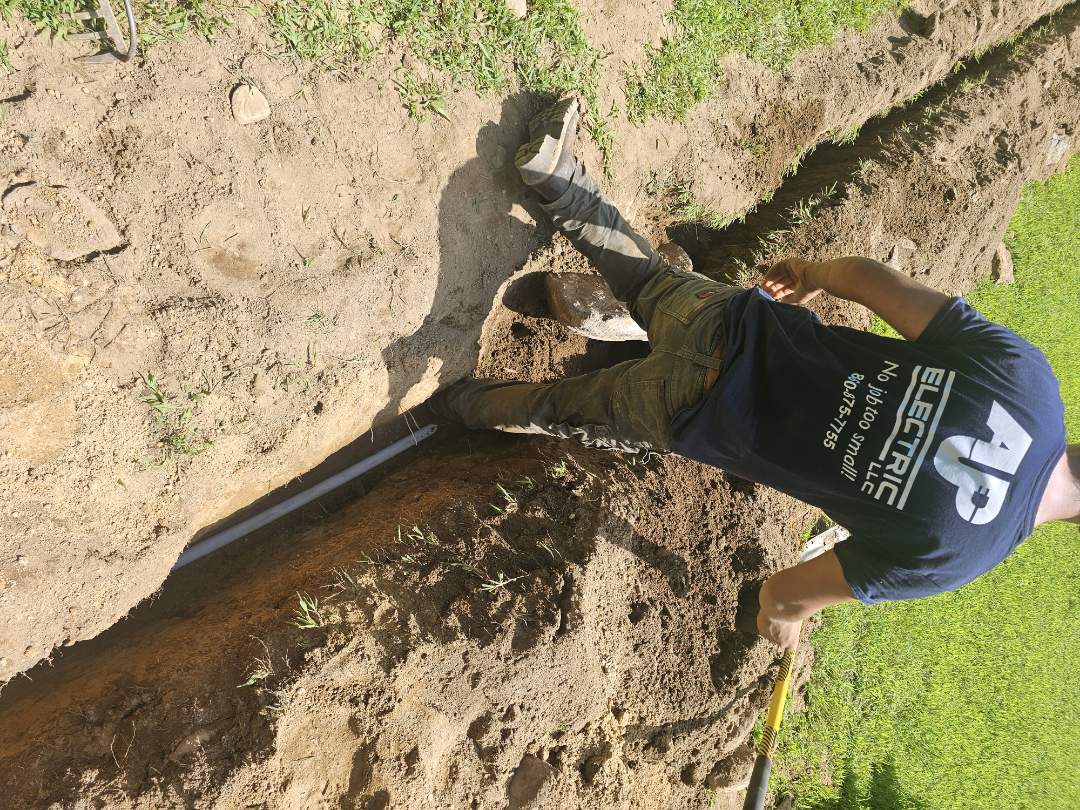 Aj p electrical work with trenching, piping and r v outle