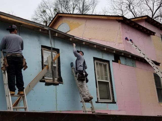Atlanta, GA - The crew is removing the siding and trim on this Atlanta home. Preparing it for new James Hardie Siding and Trim. Atlanta, GA - The crew is removing the siding and trim on this Atlanta home. Preparing it for new James Hardie Siding and Trim.