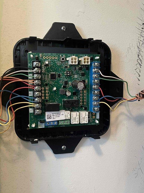 Responded to call back regarding furnace fan continuously running since previous service visit. Inspected control board with green LED illuminated, examined wiring connections at terminals, and verified proper operation of fan circuit. Issue resolved by correcting relay logic on the electronic control board that was causing the fan to remain engaged.