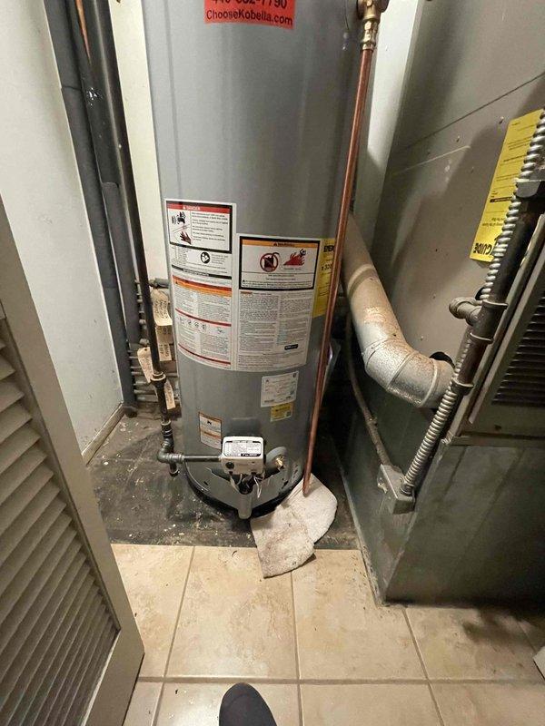 Completed installation of a new 40-gallon natural gas water heater as follow-up to work previously sold by Luke. Installation included connecting copper supply lines with hot/cold valves and proper venting through galvanized metal ductwork. Job completed in 3 hours with assistance from DZ.
