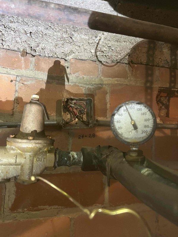 Inspected property for multiple reported leaks including water supply line, tub spout in two bathrooms, sink sprayer in basement, and corroded standpipe in laundry room. Diagnosed pressure issues in shower and occasional floor drain backup in laundry room. Identified faulty gas valve by washer/dryer requiring replacement and assessed suitability for automatic water shutoff system installation.