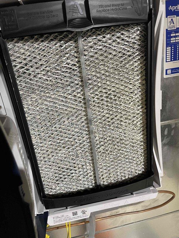 Performed routine heating maintenance on member's system. Inspected and serviced humidifier component, ensuring proper HydroCore installation. Conducted combustion analysis using Testo 310 analyzer, confirming acceptable CO (10 ppm) and CO2 (7.12%) levels. System is operating within normal parameters despite customer's temperature concerns.