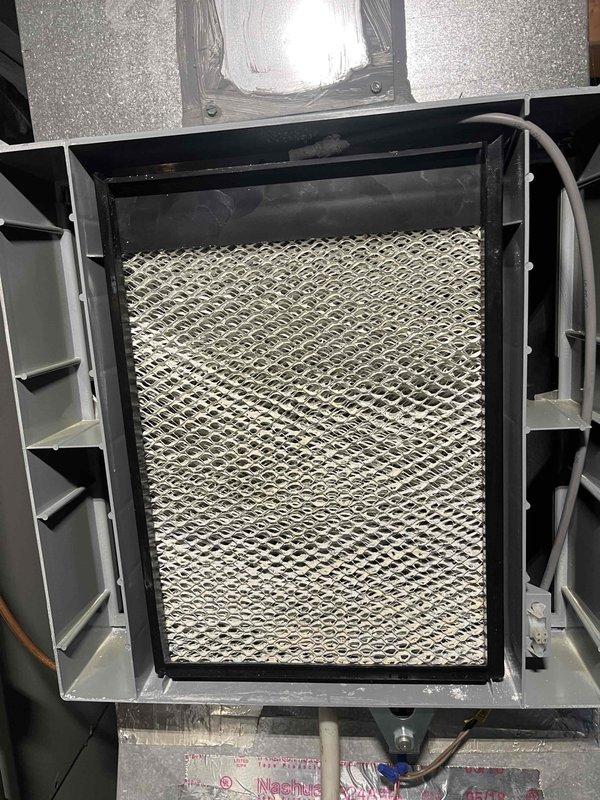 Performed installation of Aprilaire filter upgrade kit as previously sold. Removed existing filter and installed new multi-pleated filtration system with diamond-patterned mesh structure in customer's Trane unit. Successfully completed the upgrade per service agreement, with all necessary materials sourced from inventory.